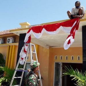 Satgas TMMD Pelopori Pemasangan Bendera