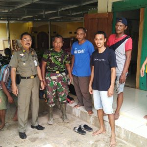 Peran Aktif Satpol PP Bersama TMMD