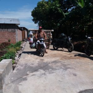 Pedagang Menikmati Jalan Satgas TMMD 107