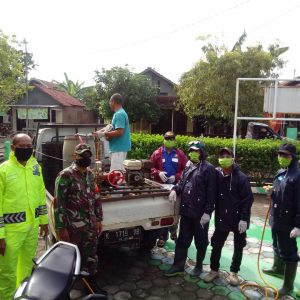 Satgas TMMD Bersama Warga Rapatkan Barisan Gempur COVID -19