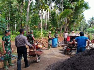 Kekompakan Bekerja TNI dan POLRI Bersama Rakyat Terlihat Dalam Satgas TMMD